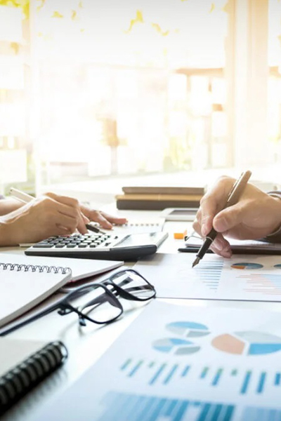 business man financial inspector and secretary making report calculating or checking balance internal revenue service inspector checking document audit concept 1024x683 3